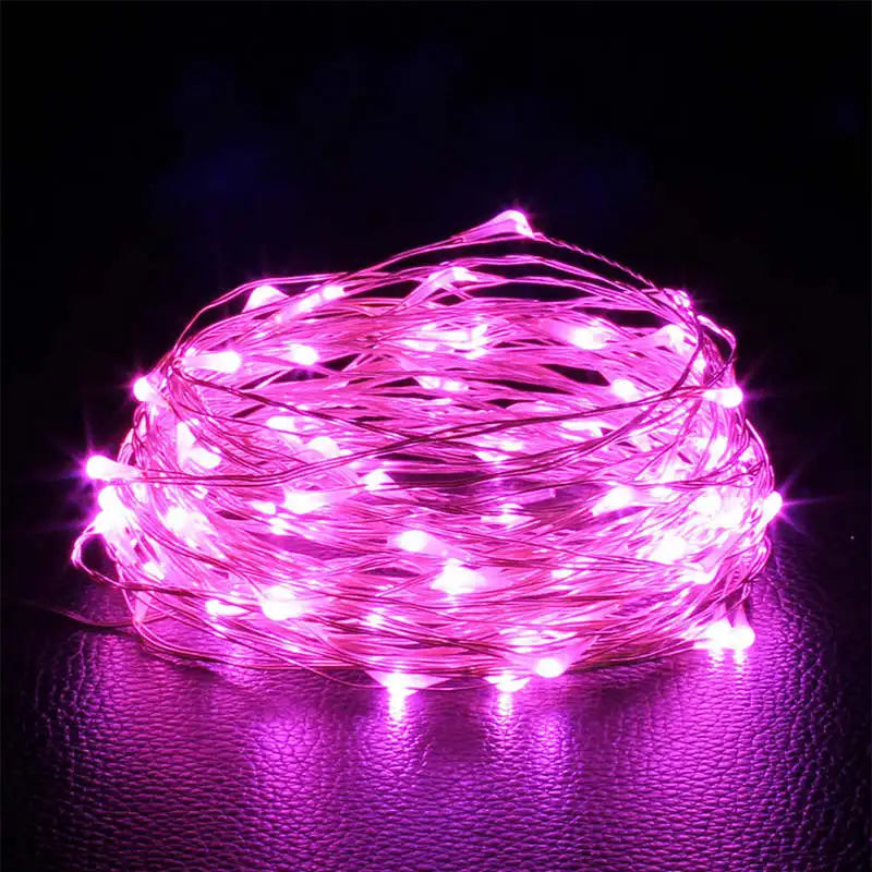 Fairy lights wrapped around headboard