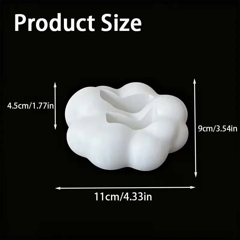 Cloud shaped caddy holding phone and gadgets