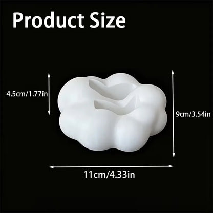 Cloud shaped caddy holding phone and gadgets