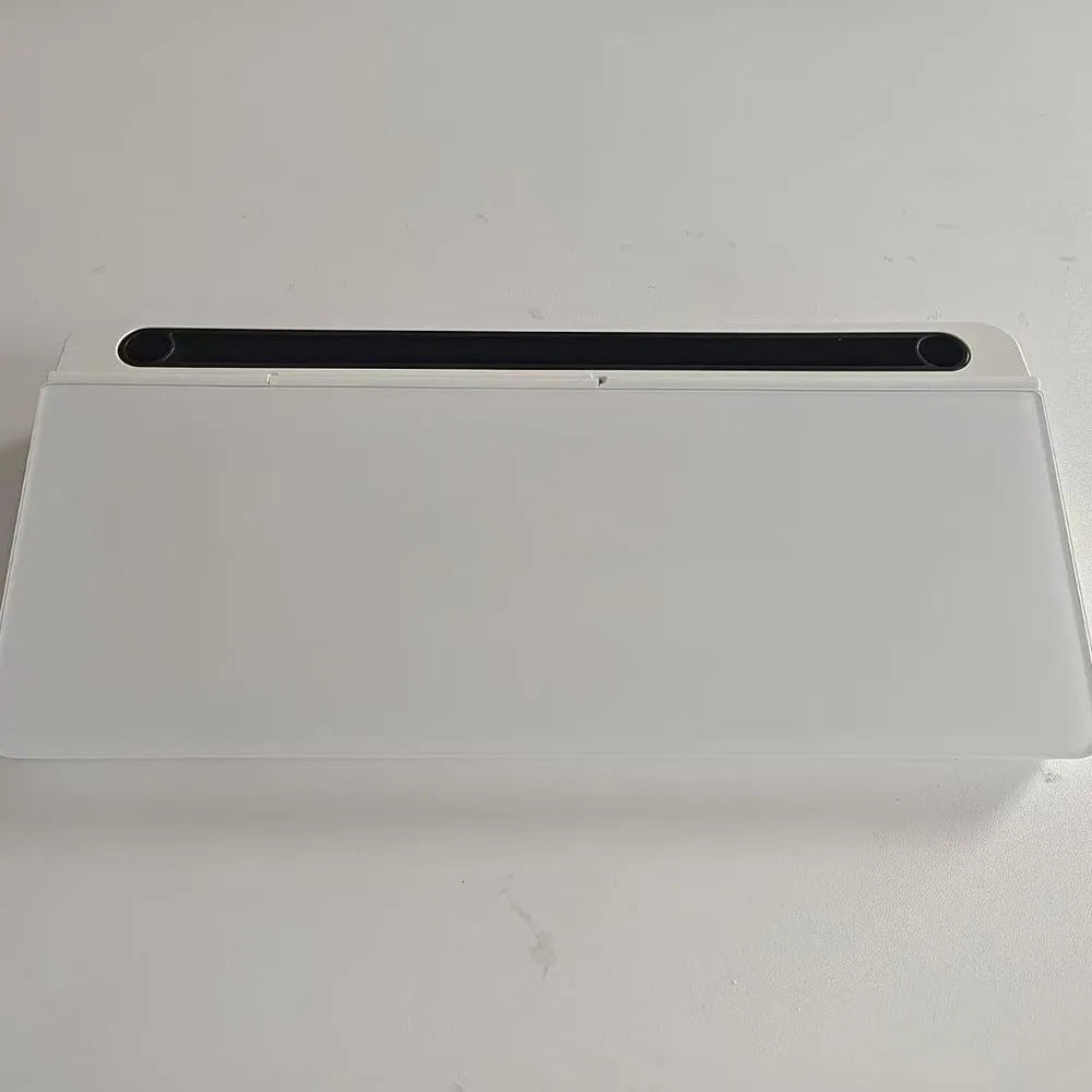 Black and white glass desk planners shown together