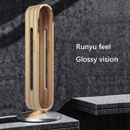 Gaming headset hanging on bamboo desk stand