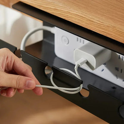Black under desk cord holder with cables inside
