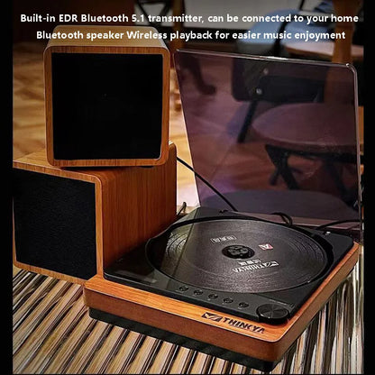 Wooden desktop CD player with a translucent dust cover, view 3