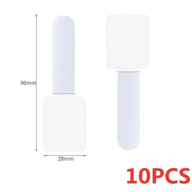 Self adhesive cable ties in white on a desk