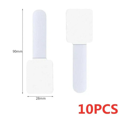 Self adhesive cable ties in white on a desk