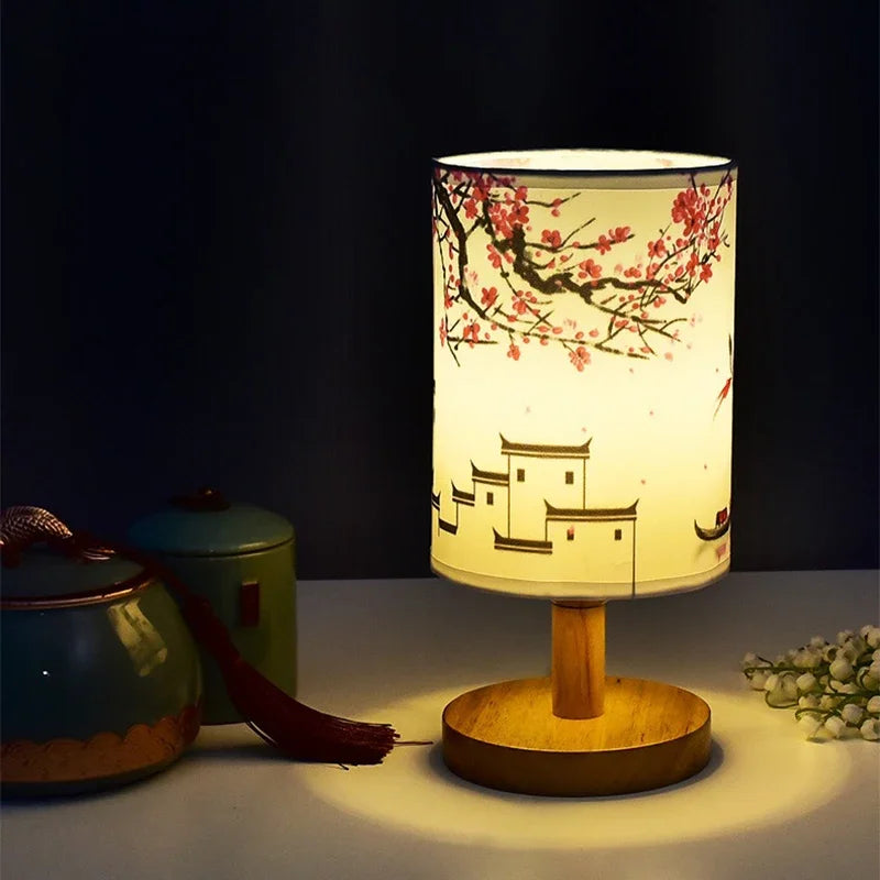 Square LED bedside lamp illuminated displaying warm glow