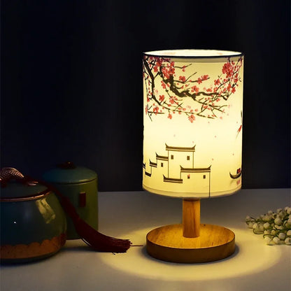 Square LED bedside lamp illuminated displaying warm glow