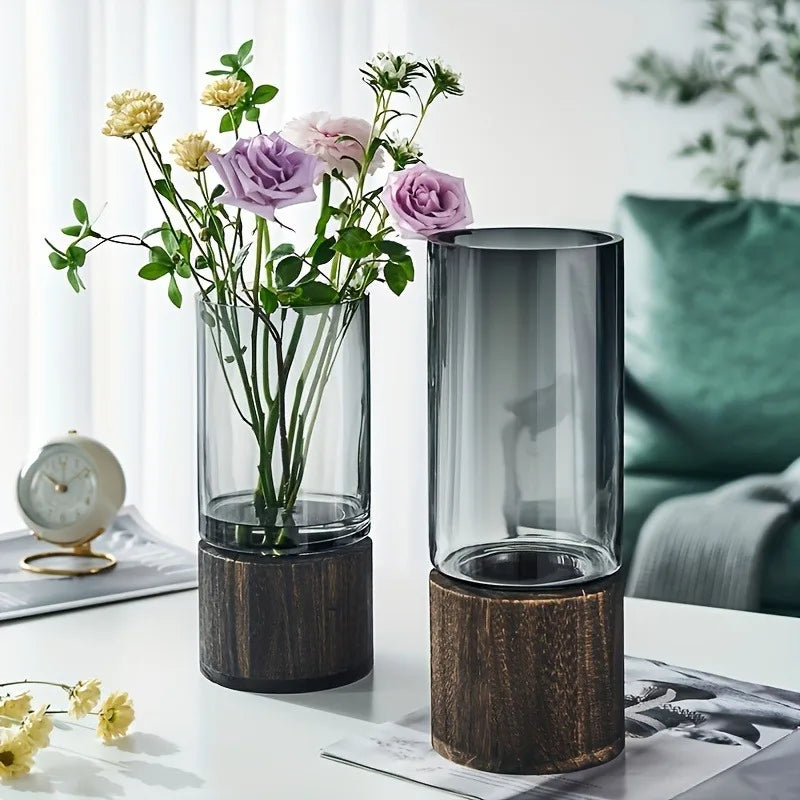 Empty clear glass vase styled on a shelf