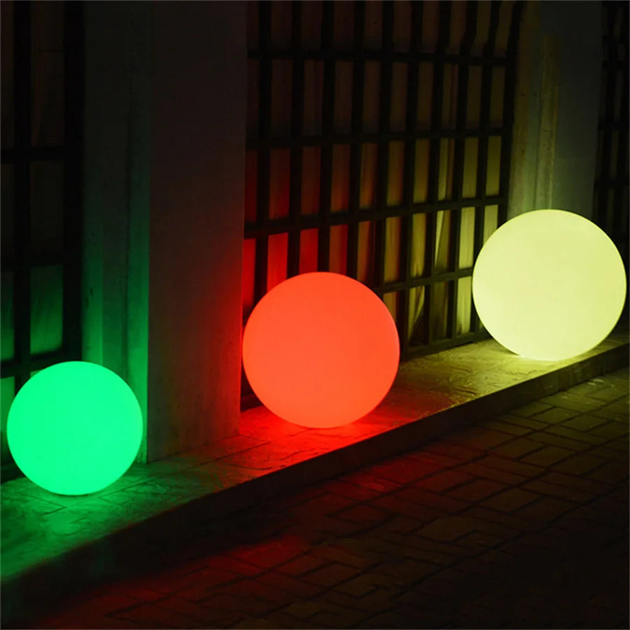 Battery powered glow ball on patio decking