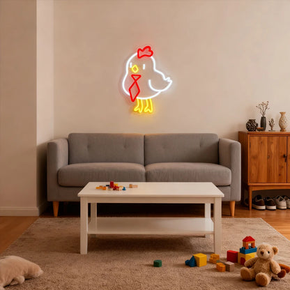 Neon sign of a chicken in a living room with a gray sofa and wooden cabinet.