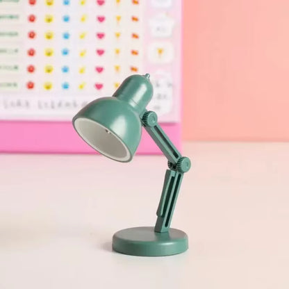 Foldable LED light clipped onto book pages