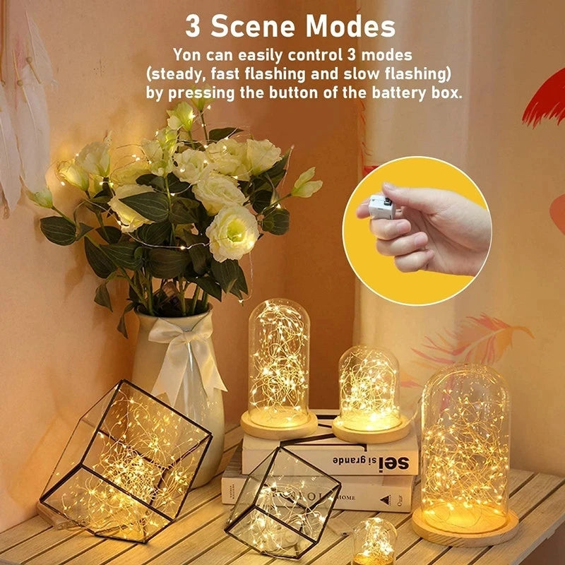 Warm white fairy lights glowing in glass jar