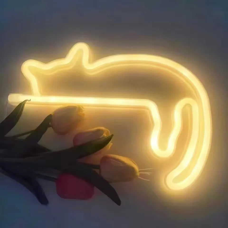 Illuminated cat neon light sign displaying warm white glow, perfect for cozy bedroom ambient lighting