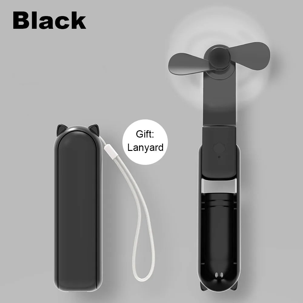 Black portable fan with lanyard on a gray background