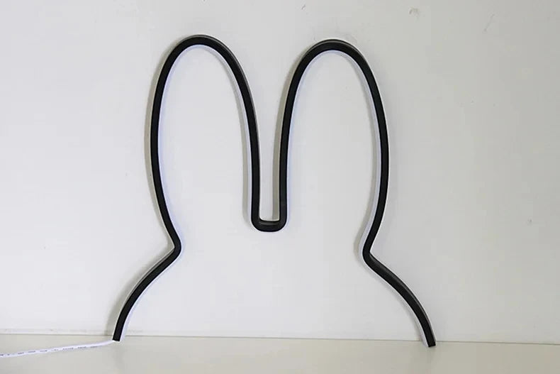 Rabbit shaped night light illuminated with soft warm light