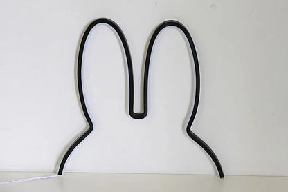 Rabbit shaped night light illuminated with soft warm light