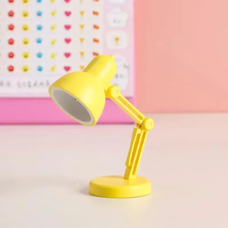 Magnetic clip light attached to laptop screen