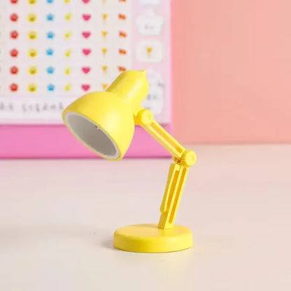 Magnetic clip light attached to laptop screen