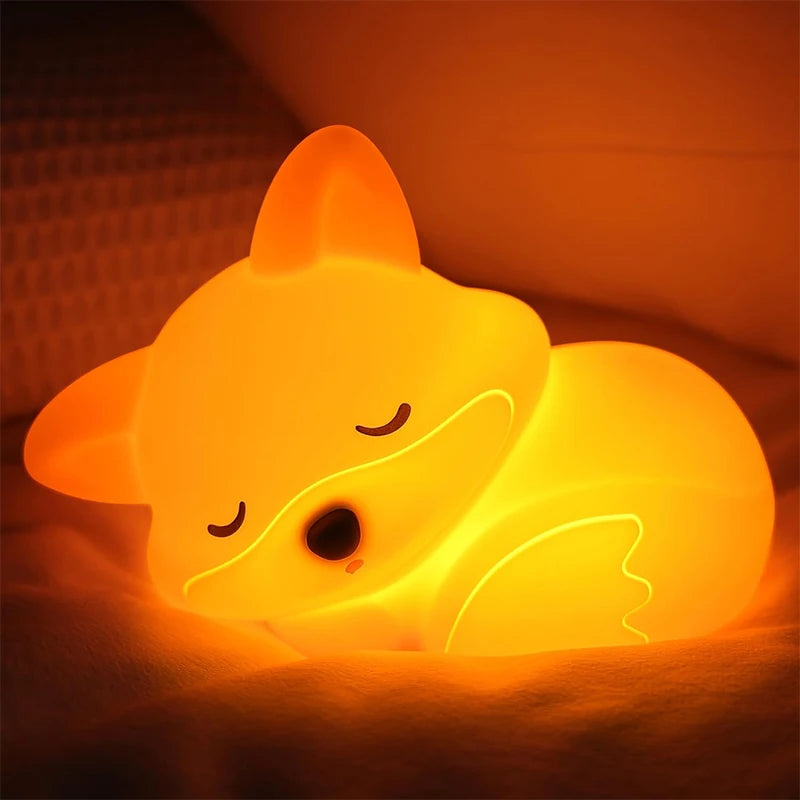 Soft fox night light glowing on bedroom nightstand for nursery bedside use